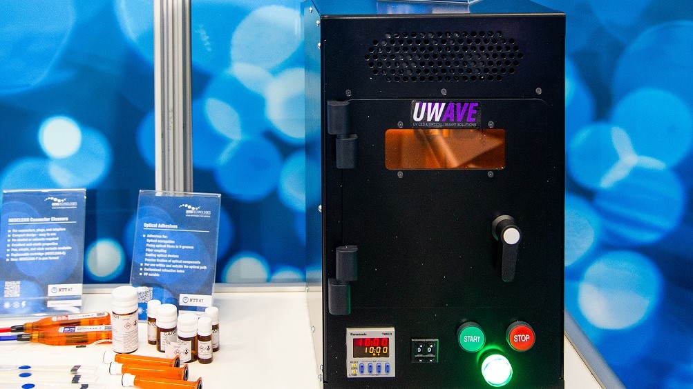 Photo of optical adhesives from NTT-AT as well as the UWave UV Chamber Curing Oven